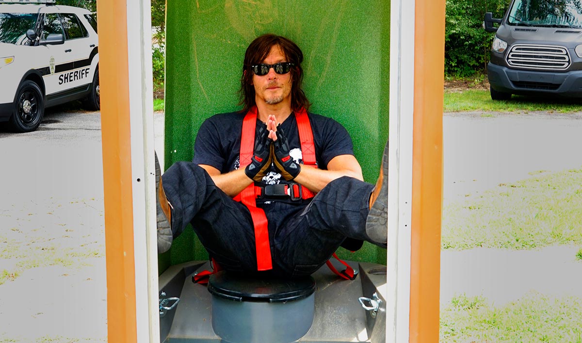 Norman Reedus Competes in a Porta Potty Race in North Carolina
