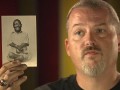 Extra Scene: Episode 205: Freakshow: Florida Freakshow Todd and Danielle meet Johnny Meah, an acclaimed banner painter who gifts them with an "Otis the Frog Boy" banner.