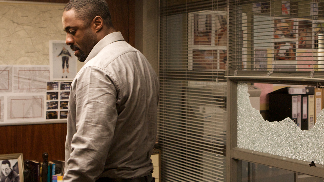 Luther lashes out by breaking a window