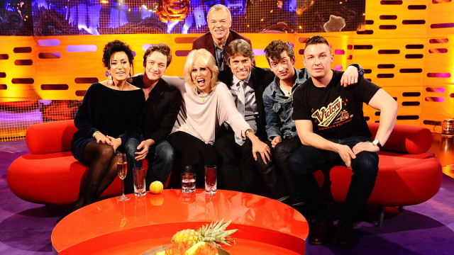 L-R: Graham strikes a pose with Nancy Dell'Olio, James McAvoy, Joanna Lumley, John Bishop and the Arctic Monkeys' Alex Turner and Jamie Cook.