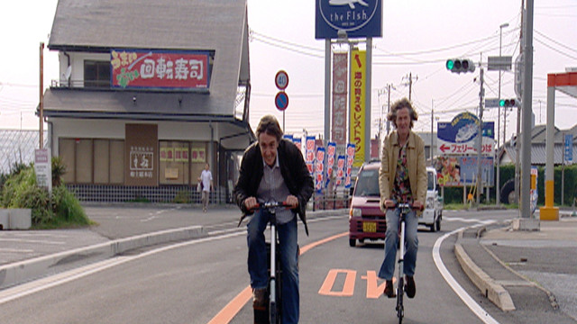 Richard and James ride bikes