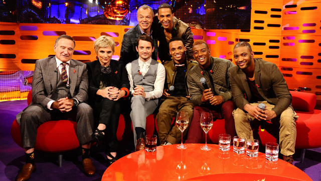 Tight squeeze: Graham's red couch is jam-packed with Robin Williams, Jennifer Saunders, Elijah Wood and JLS.