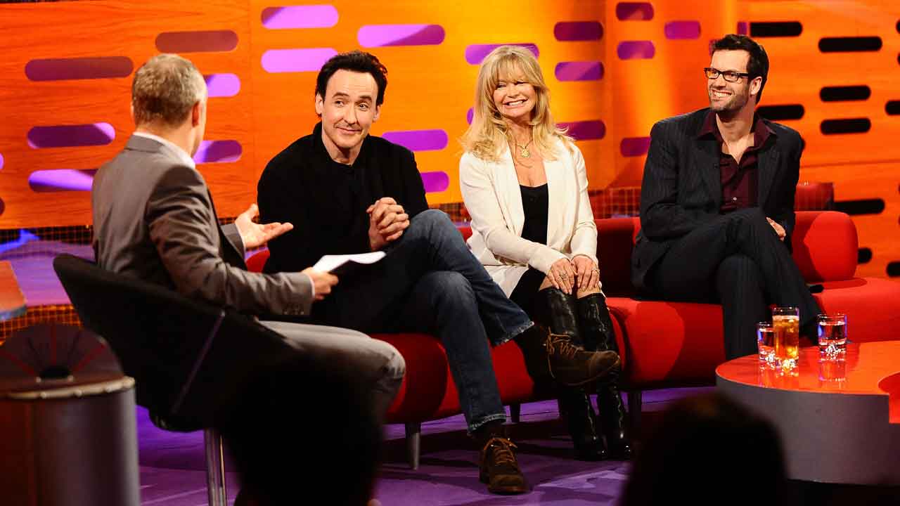 It's a royal laugh-in with John Cusack, Goldie Hawn and Marcus Brigstocke.