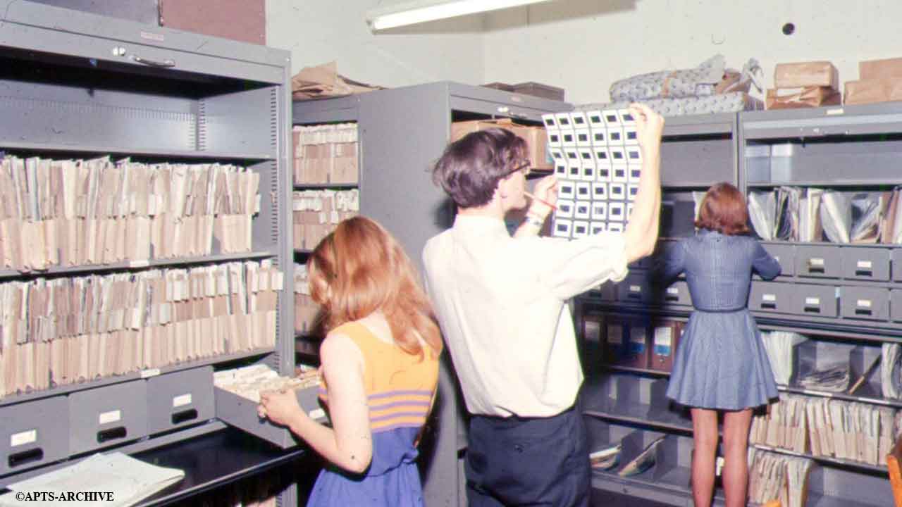 Roger Wilson, with two production secretaries in the News Photographic Library.