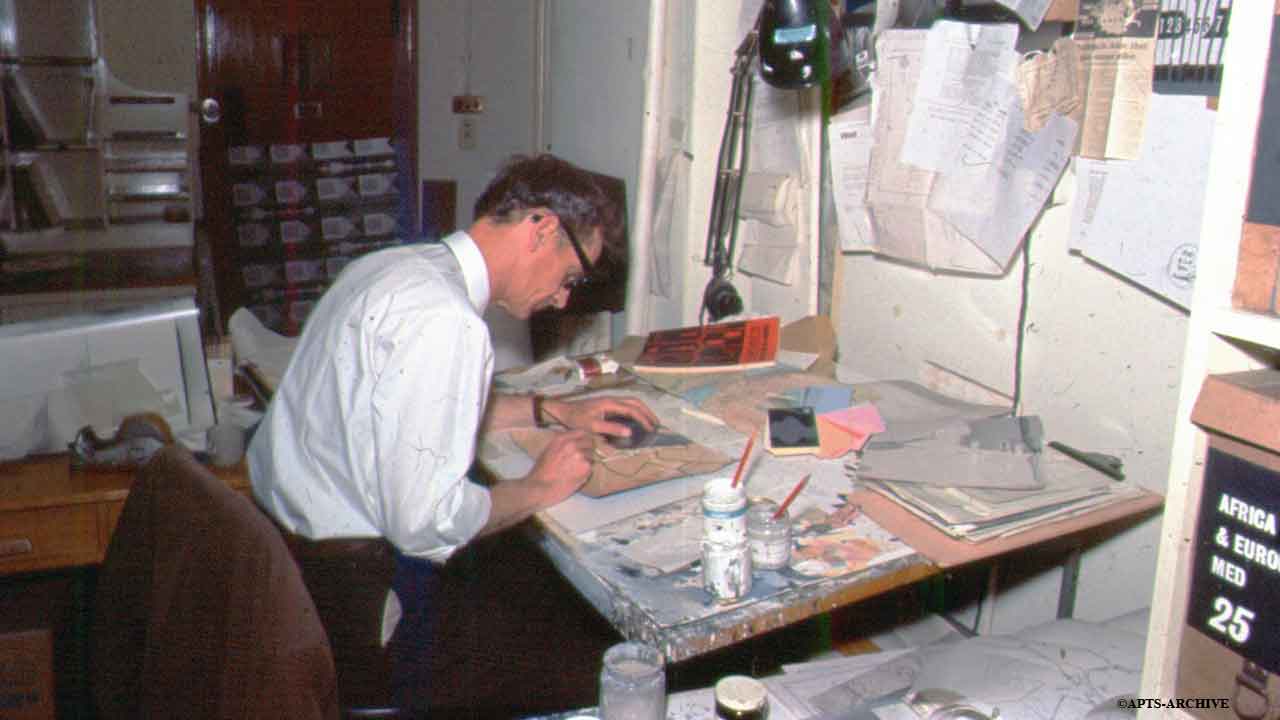 A graphic artist preparing visuals to illustrate a news story.