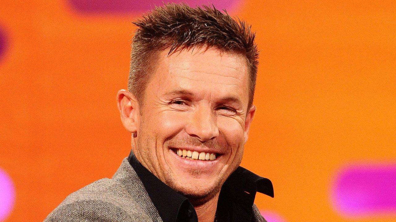 Austrian skydiver Felix Baumgartner, who in October 2012 wowed the world record books with his daredevil jump to Earth, making him the first human to break the sound barrier outside of a vehicle, smiles for the camera.