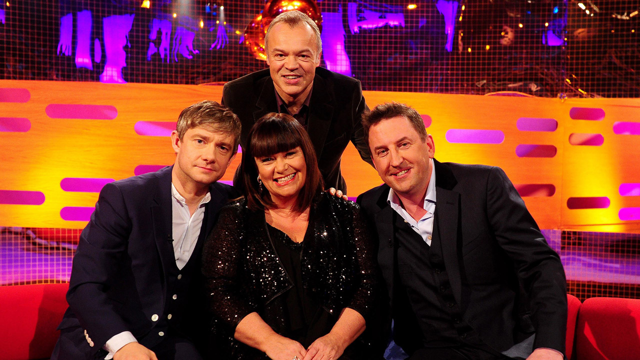 Everyone gets close for a Graham Norton-style group pose.