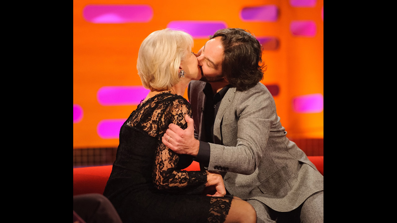 Stars getting naughty! Paul Rudd and Helen Mirren share a snog.