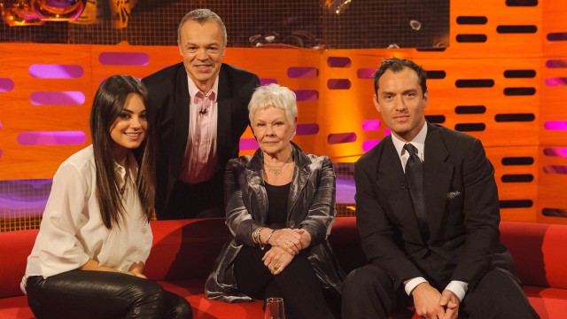 Dame Judy Dench, Mila Kunis, and Jude Laws pose for a photo.