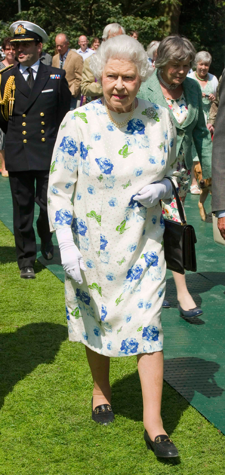 Her Majesty The Queen visiting exhibits at the Coronation Festival on July 11. (Photo: Express Newspapers via AP Images)