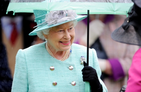 Queen Elizabeth II hosts a garden party at the Palace of Holyrood house in Edinburgh. (Photo via AP)