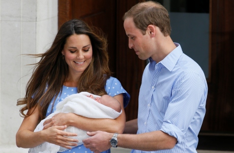 Britain's Prince William, right, and Kate, Duchess of Cambridge hold the Prince of Cambridge, Tuesday July 23, 2013, as they pose for the media outside St. Mary's Hospital's exclusive Lindo Wing in London where the Duchess gave birth on Monday July 22. The boy, who is third in line to the British throne, has since been named George Alexander Louis by his parents and will be known as Prince George of Cambridge. (AP Photo/Kirsty Wigglesworth)