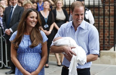 Britain's Prince William and Kate, Duchess of Cambridge hold the Prince of Cambridge, Tuesday July 23, 2013, as they pose for photographers outside St. Mary's Hospital exclusive Lindo Wing in London where the Duchess gave birth on Monday July 22. The boy, who is third in line to the British throne, has since been named George Alexander Louis by his parents and will be known as Prince George of Cambridge. (AP Photo/Lefteris Pitarakis)