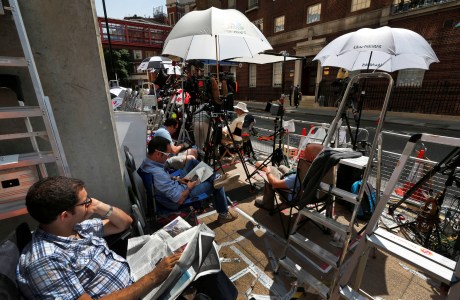 Members of the media sit outside the Lindo Wing of St. Mary's Hospital, awaiting the birth of the royal child. (AP Photo/Lefteris Pitarakis)