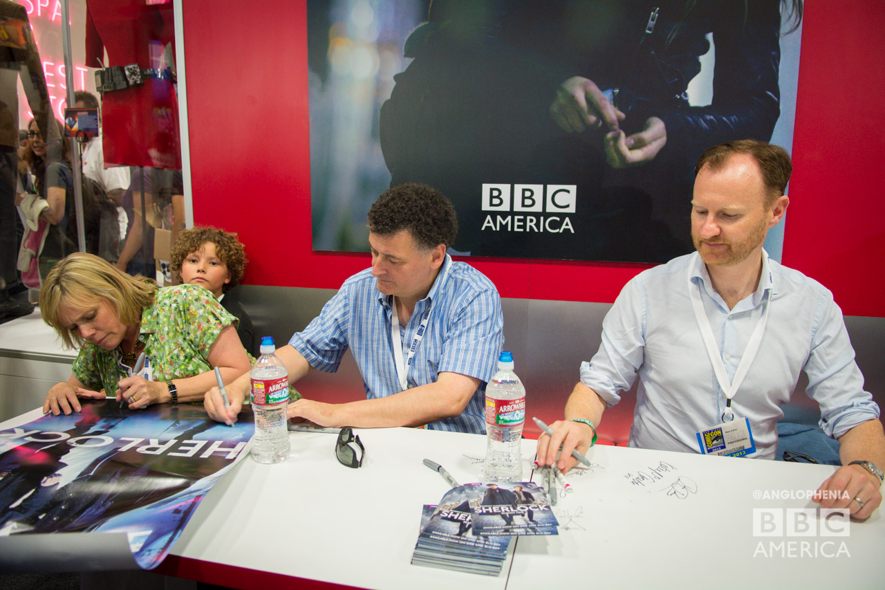 Sue Vertue, Steven Moffat, and Mark Gatiss signing for fans at the BBC AMERICA booth. (Photo: Dave Gustav Anderson)