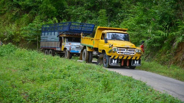 Jeremy Clarkson and Richard Hammond heading north through Burma in their lorries
