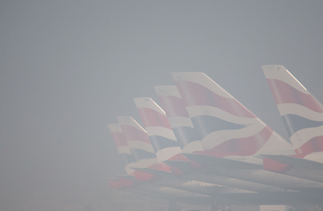 Spring weather March 13th. British Airways planes on the apron at Heathrow Airport, as number of flights across the UK have been cancelled because of early-morning fog. Picture date: Thursday March 13, 2014. Heathrow airport reported "minor delays" on a "few" in-bound flights, but said there were no cancellations or delays to flights from the airport. Arrivals and departures were cancelled at London City Airport where forecasters said visibility was down to below 100 metres. Flights have also reportedly been cancelled at Heathrow, Gatwick and Manchester airports. See PA story TRANSPORT Fog. Photo credit should read: Steve Parsons/PA Wire URN:19283240