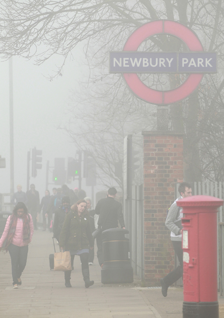 Spring weather March 13th. Commuters make their way in the fog to Newbury Park Underground Station, in east London, as fog covered much of the UK leading to transport problems. Picture date: Thursday March 13, 2014. See PA story TRANSPORT Fog. Photo credit should read: Sean Dempsey/PA