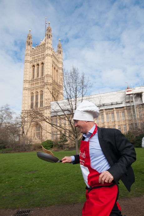ournalist George Parker Rehab Parliamentary Pancake Race in Victoria Tower Gardens, Westminster, London, Britain - 04 Mar 2014 The charity race is organised as a competition between journalists, MPs and members of the House of Lords and proceeds are given to the charity 'Rehab'. (Rex Features via AP Images)