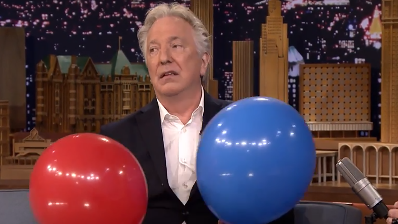 Alan Rickman looks less than enthused but he's "acting." (YouTube)