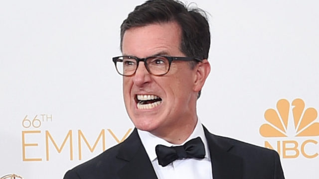 Writer/Producer/Host Stephen Colbert, winner of the for Outstanding Variety Series Award for The Colbert Report, poses in the press room during the 66th Annual Primetime Emmy Awards held at Nokia Theatre L.A. Live on August 25, 2014 in Los Angeles, California.