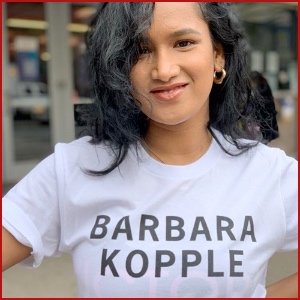 White shirt with black text that says Barbara Kopple