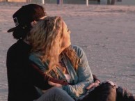 Liz surprises Tiphany with trip to the beach at sunset.