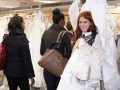 Bride-to-be secures her dress Bride-to-be secures her dress