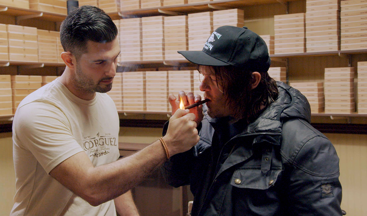Norman Pushes Up His Sleeves to Try Rolling Cigars by Hand