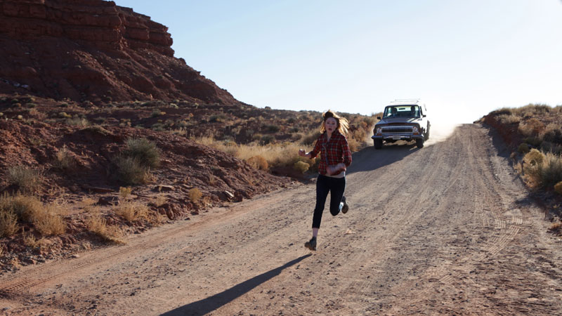 Amy runs from the car