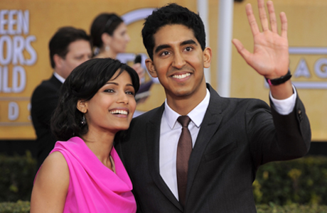 Freida Pinto, left and Dev Patel