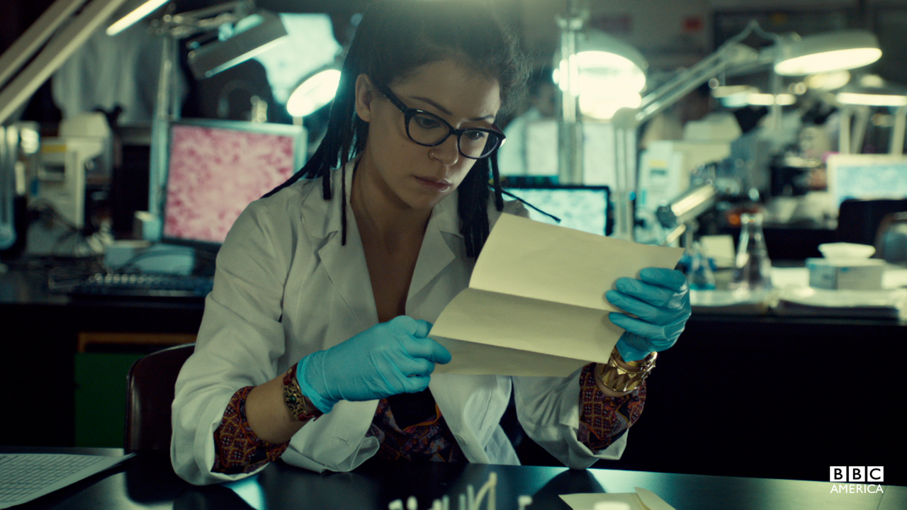 Cosima takes a peek at Delphine's grades.