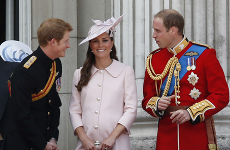 Prince Harry joins his brother and sister-in-law. This is the Duchess's last appearance with her delivery date pending. (AP)