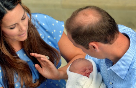 The Duke and the Duchess of Cambridge, leave The Lindo Wing of St. Mary's Hospital, in London, Tuesday, July 23, 2013, carrying their new born son, the Prince of Cambridge, who was born on Monday. into public view for the first time. (AP Photo/John Stillwell, Pool)