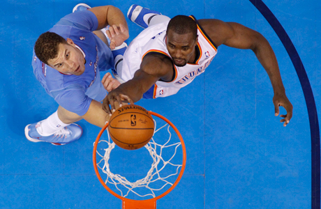 Oklahoma City Thunder forward Serge Ibaka (9) dunks on Los Angeles Clippers forward Blake Griffin. (Photo: Sue Ogrocki/AP)