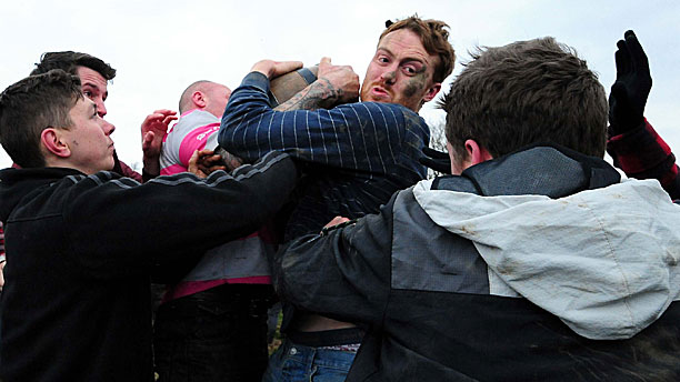 Each team tries to. Bottle kicking Match. Bottle kicking and Hare pie Scramble.