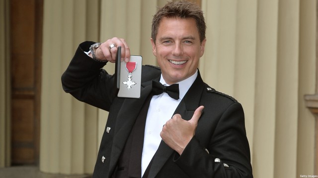 John Barrowman and his OBE (Pic: WPA Pool/Getty Images)