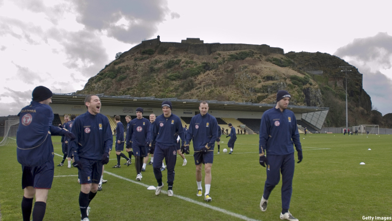 DUMBARTON, SCOTLAND - FEBRUARY 4: The Scotland Squad warm up during George Burley's first training session as Scotland Manager at Dumbarton FC, with Dumbarton Rock in the background, on February 4, 2008 in Dumbarton, Scotland. (Photo Robert Paterson/Getty Images)