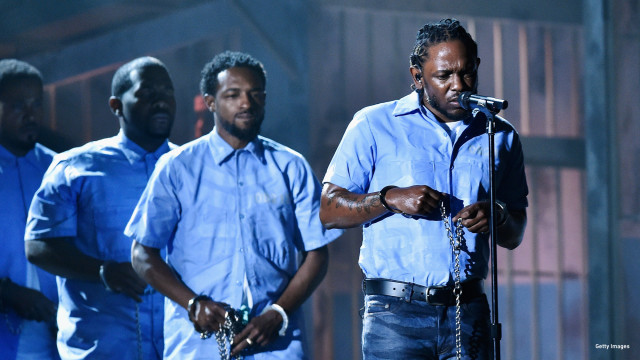 Rapper Kendrick Lamar (C) performs onstage during The 58th GRAMMY Awards at Staples Center on February 15, 2016 in Los Angeles, California.