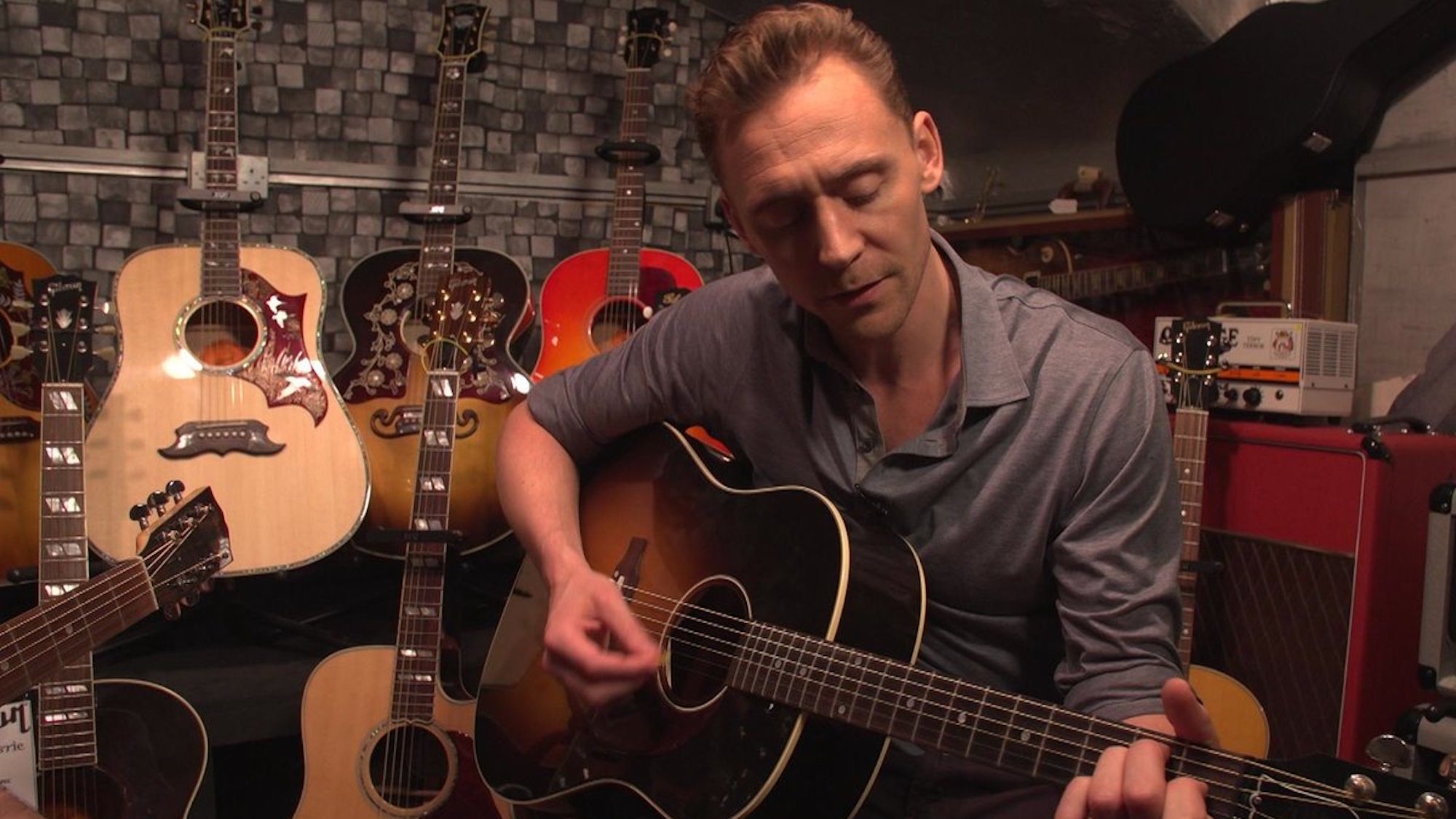 WATCH Tom Hiddleston Sings and Plays Guitar in London Anglophenia