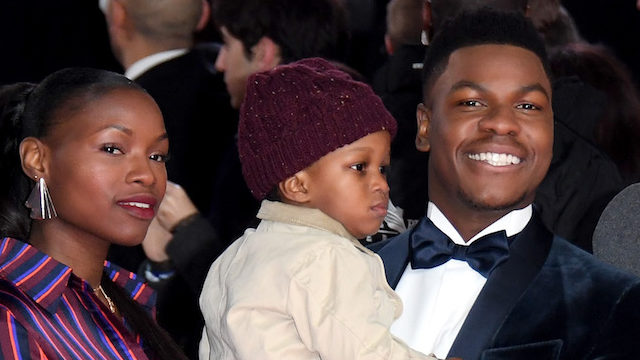 Actor John Boyega (C) poses with guests as he attends the European Premiere of ‘Star Wars: The Last Jedi’ at Royal Albert Hall on December 12, 2017 in London, England.