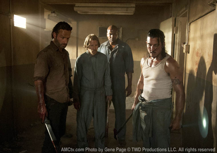 Rick Grimes (Andrew Lincoln), Axel (Lew Temple), Oscar (Vincent Ward) and Tomas (Nick Gomez) in Episode 2 of The Walking Dead
