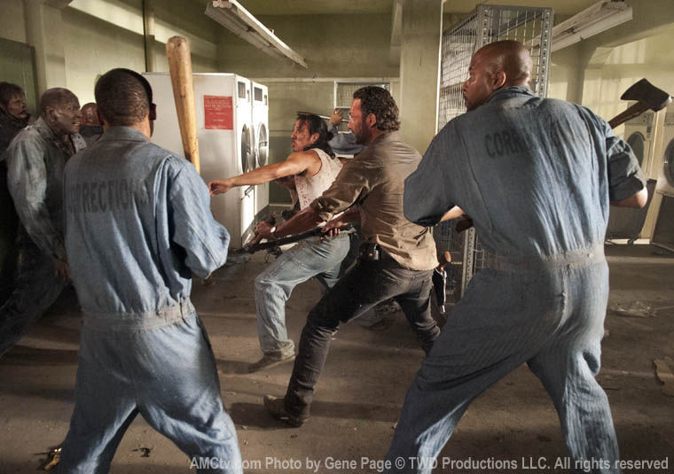 Andrew (Markice Moore), Oscar (Vincent Ward), Rick Grimes (Andrew Lincoln) and Tomas (Nick Gomez) in Episode 2 of The Walking Dead