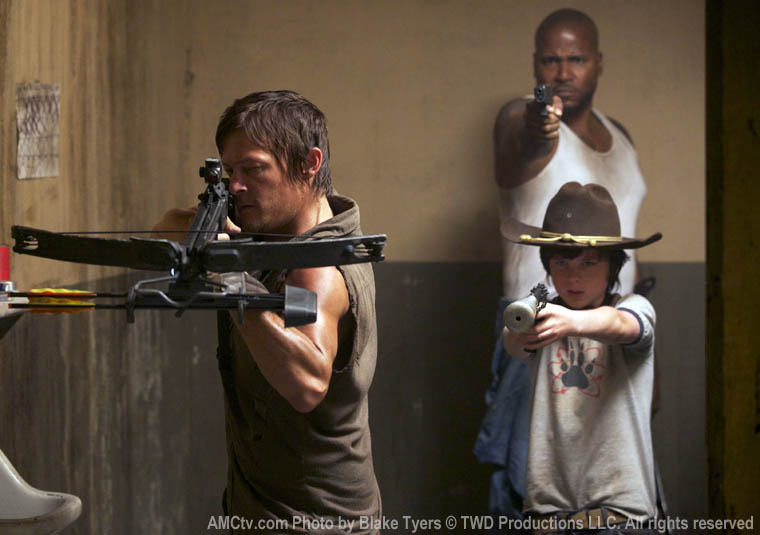 Daryl Dixon (Norman Reedus), Oscar (Vincent Ward) and Carl Grimes (Chandler Riggs) in Episode 6 of The Walking Dead