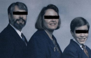 Portrait of a family of three - man, woman, son - with black bars over their eyes.