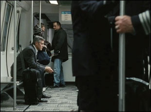 George Clooney does the airport stare. (photo)